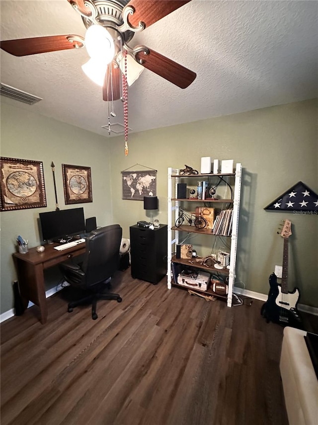 office space with hardwood / wood-style floors and a textured ceiling