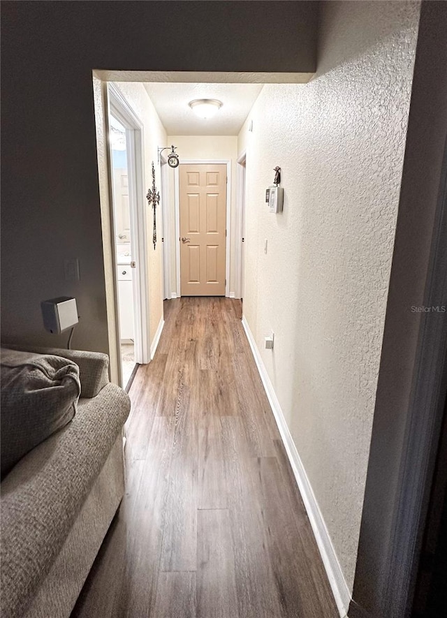 hall featuring hardwood / wood-style flooring