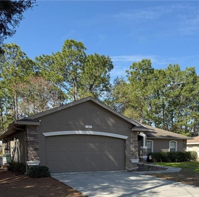 single story home featuring a garage