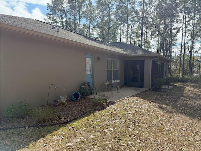 back of house featuring a patio area