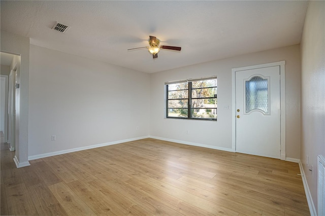 entrance foyer featuring ceiling fan and light hardwood / wood-style floors