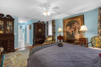 bedroom featuring ceiling fan