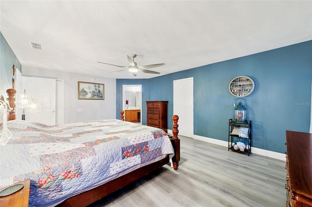 bedroom with light wood-type flooring and ceiling fan