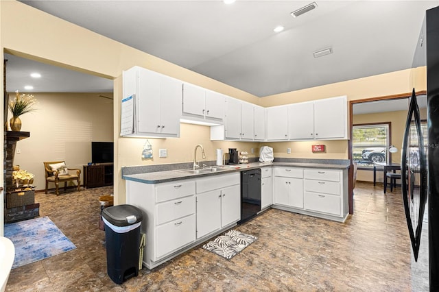 kitchen with white cabinets, black appliances, and sink