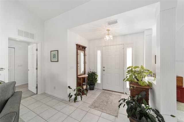 foyer with light tile patterned floors