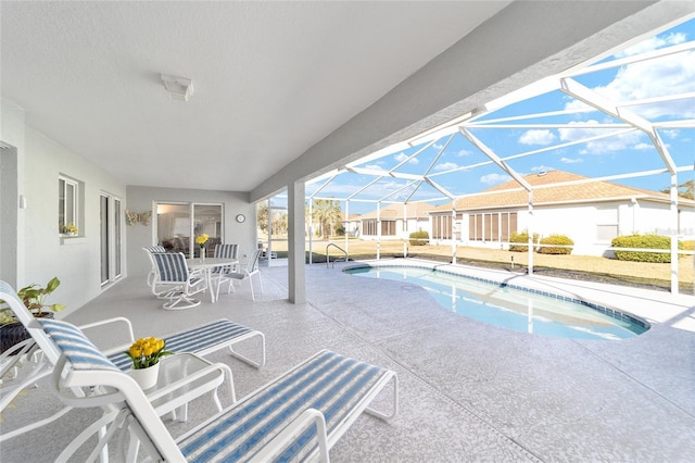 view of pool featuring a patio and a lanai