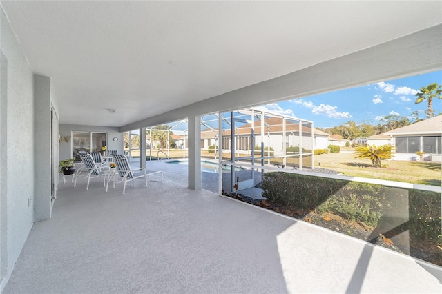 view of patio with a fenced in pool