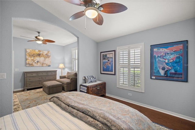 bedroom featuring wood-type flooring and ceiling fan