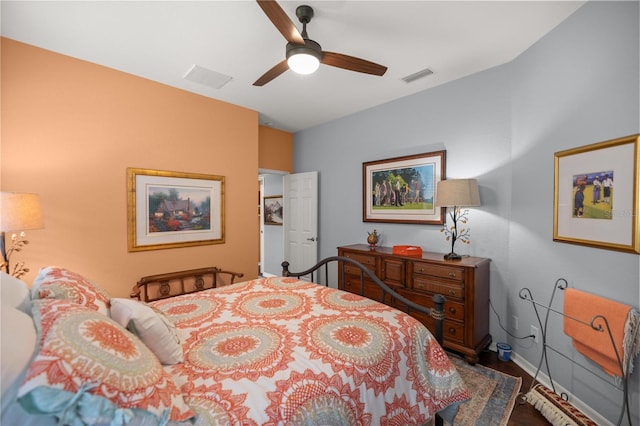 bedroom with ceiling fan and wood-type flooring