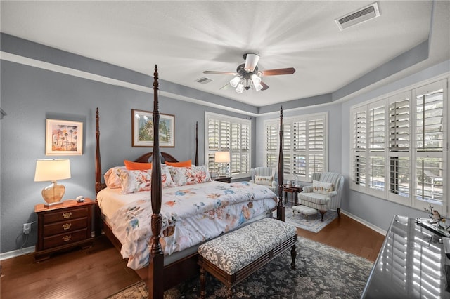 bedroom featuring hardwood / wood-style flooring and ceiling fan