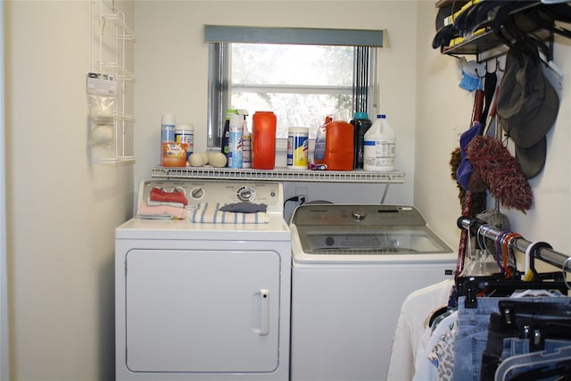 laundry room featuring washer and clothes dryer