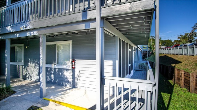 view of property exterior featuring covered porch