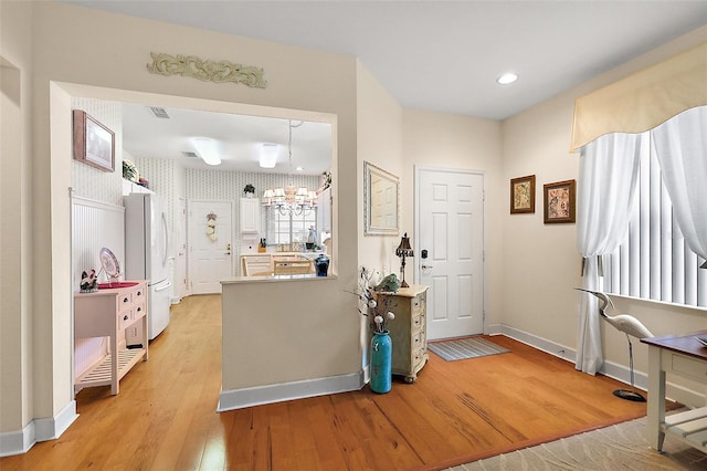 entrance foyer with light wood-type flooring