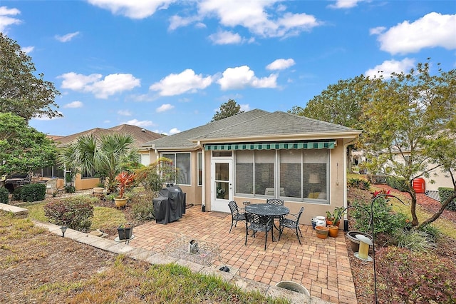 back of house featuring a patio area