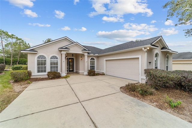 single story home with a garage