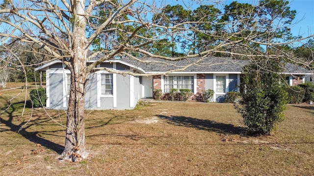 view of home's exterior featuring a lawn