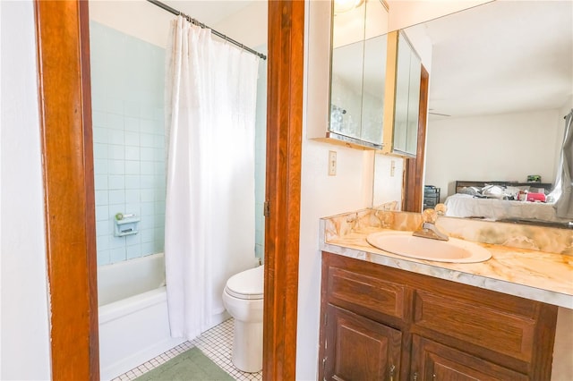 full bathroom featuring tile patterned flooring, vanity, toilet, ensuite bath, and shower / bath combo with shower curtain