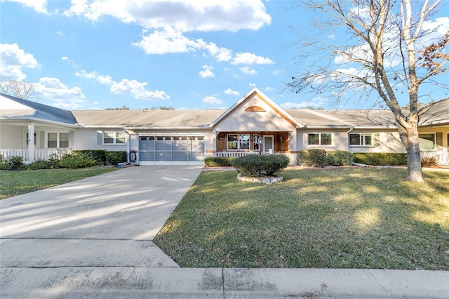 single story home featuring a front yard, a porch, and a garage