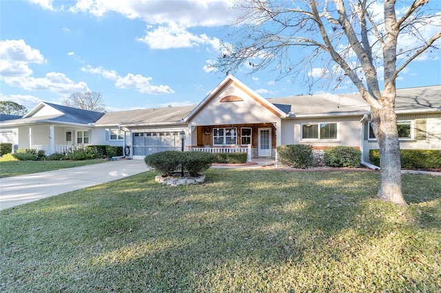 ranch-style home featuring a garage, covered porch, and a front yard