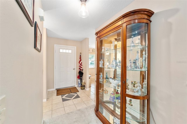 view of tiled entrance foyer