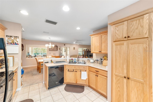 kitchen with kitchen peninsula, dishwasher, light brown cabinetry, and sink