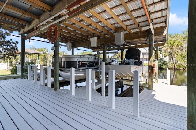 dock area featuring a water view