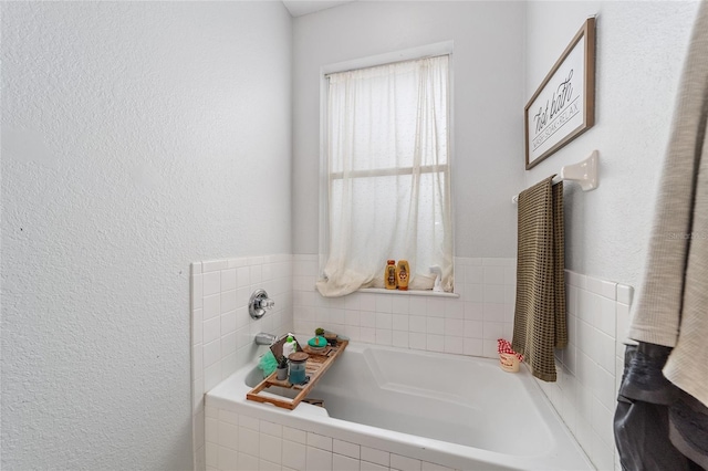 bathroom with a washtub