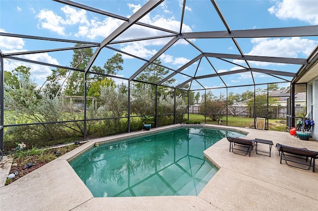 view of pool featuring a lanai and a patio