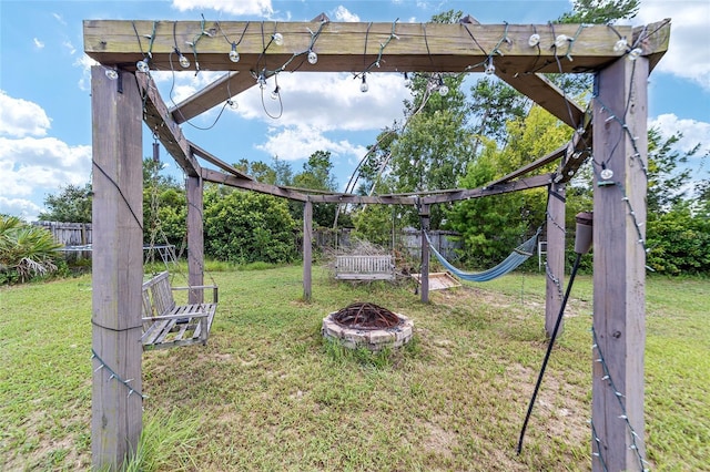 view of yard featuring a fire pit