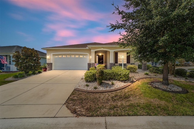 view of front of home with a garage