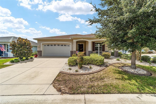 view of front facade with a garage and a front yard