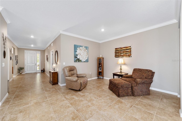 sitting room featuring crown molding