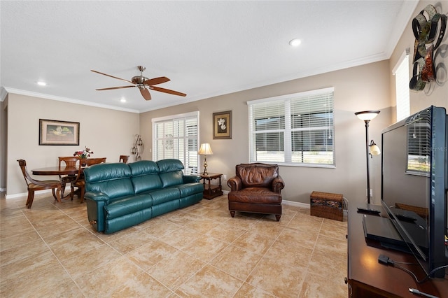 living room with light tile patterned floors, ceiling fan, and crown molding