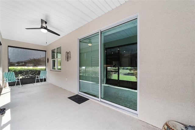 view of patio with ceiling fan