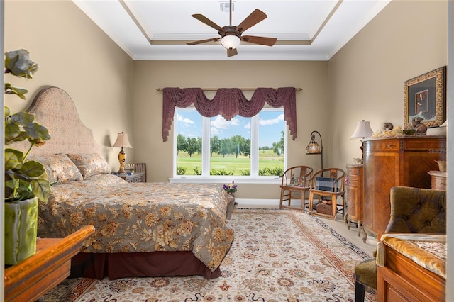 bedroom with ceiling fan and ornamental molding