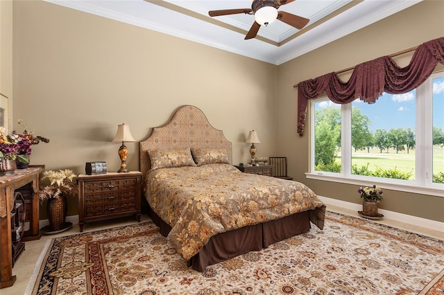 bedroom featuring ceiling fan and crown molding