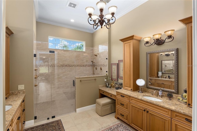 bathroom featuring vanity, tile patterned floors, an enclosed shower, and ornamental molding