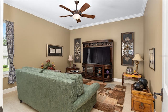 living room with ceiling fan and ornamental molding