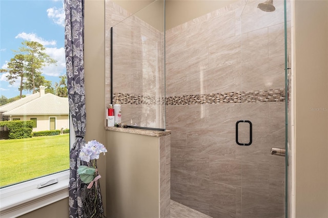 bathroom featuring an enclosed shower