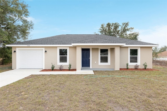 single story home featuring a garage, a front yard, concrete driveway, and a shingled roof