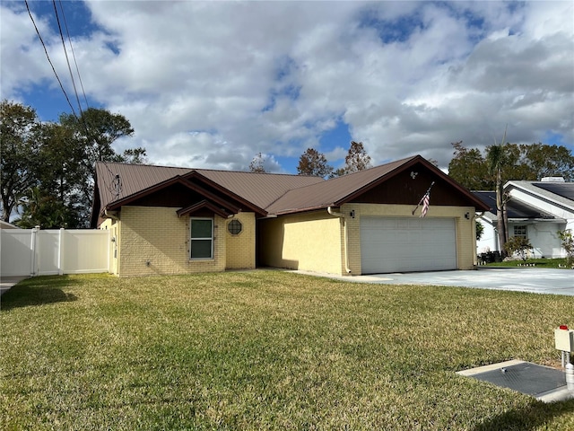 ranch-style home featuring a garage and a front lawn