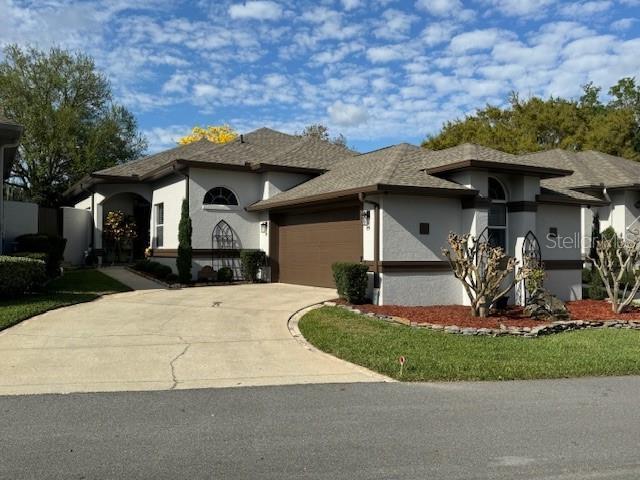 view of front of property with a garage