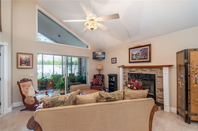 living room with high vaulted ceiling and ceiling fan