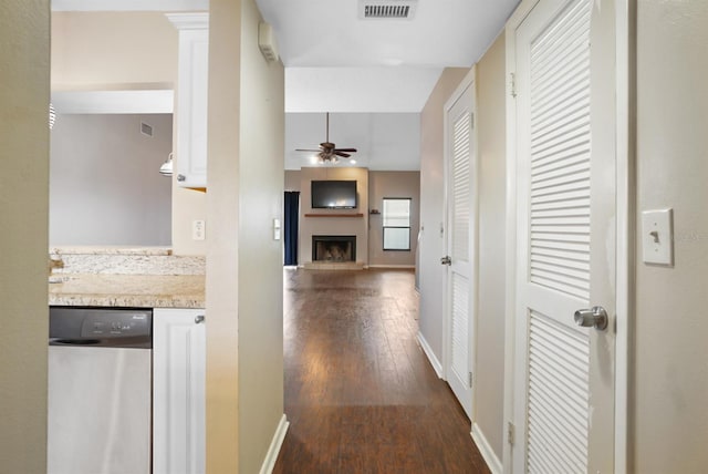 hall with dark hardwood / wood-style flooring