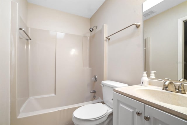 full bathroom with vanity, shower / bathtub combination, and toilet