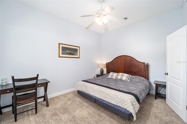 bedroom with ceiling fan and carpet