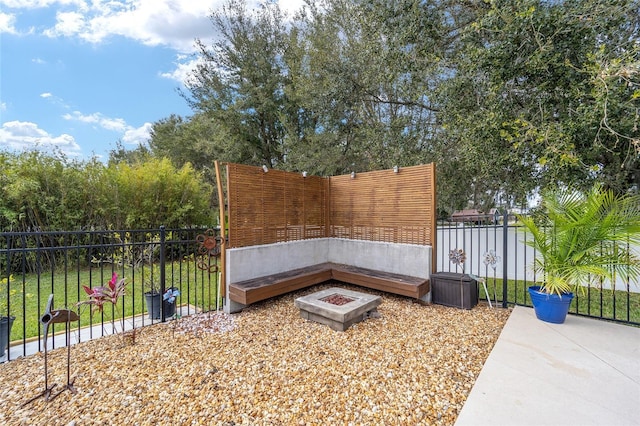 view of home's community featuring a fire pit