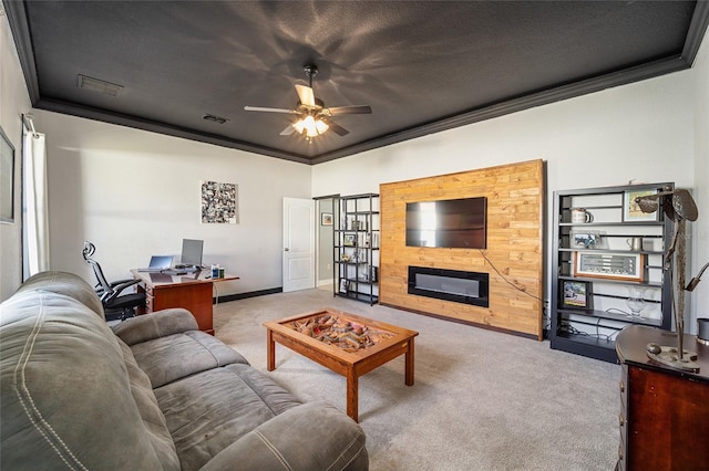 living room featuring ceiling fan, crown molding, light carpet, and a textured ceiling