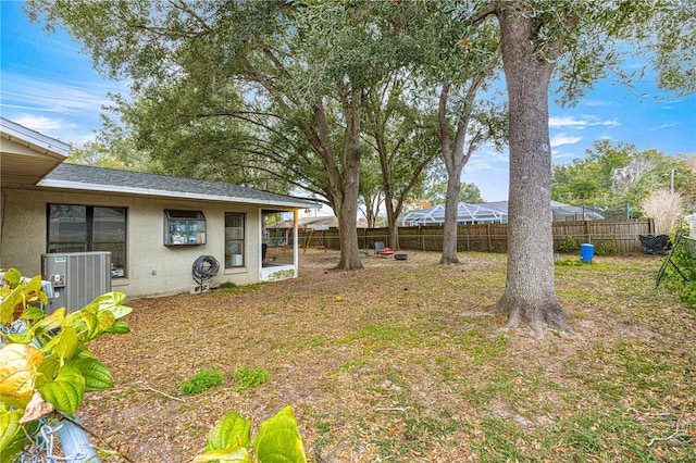 view of yard featuring central AC