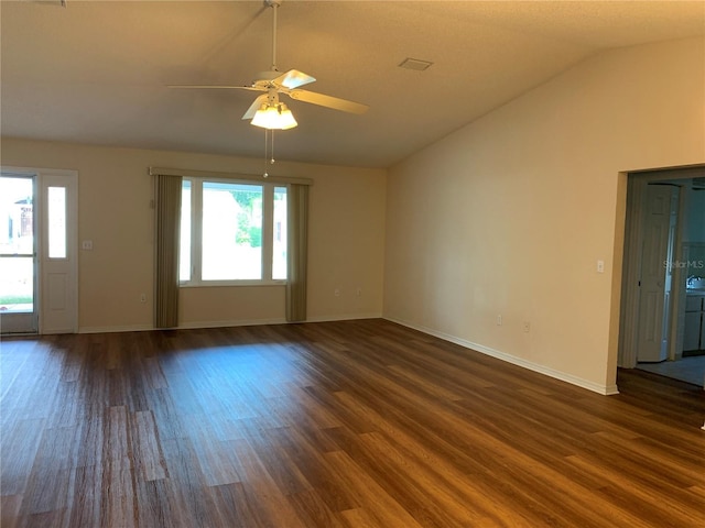 unfurnished room featuring ceiling fan, dark hardwood / wood-style flooring, and lofted ceiling